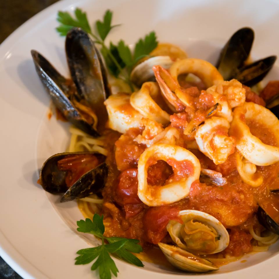  LINGUINE CARNEVALE Clams, mussels, shrimp, scallops, and calamari simmered in your choice of white wine garlic and oil sauce or red marinara sauce over linguine 